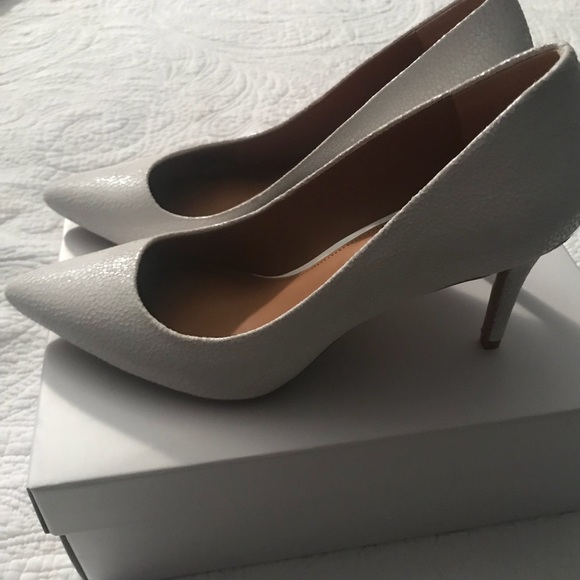 white calvin klein pumps